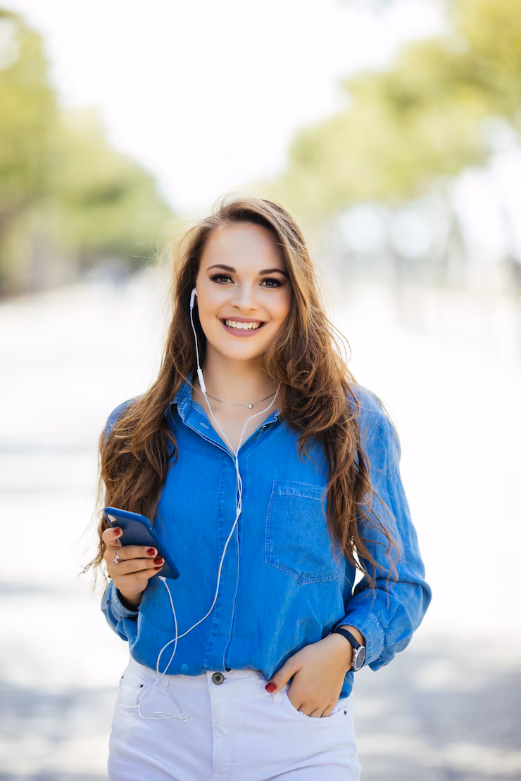 portrait-happy-smiling-woman-standing-square-sunny-summer-spring-day-outside-cute-smiling-woman-looking-you-attractive-young-girl-enjoying-summer-filtered-image-flare-sunshine_231208-6734